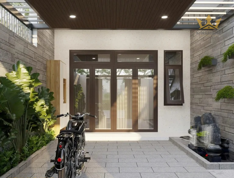 Lối vào nhà được thiết kế dẫn hướng nhẹ nhàng, đón ánh sáng tự nhiên và tạo cảm giác chào đón mỗi khi trở về.